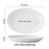A set of pure white ceramic soup bowls, including a large plate and a smaller bowl.