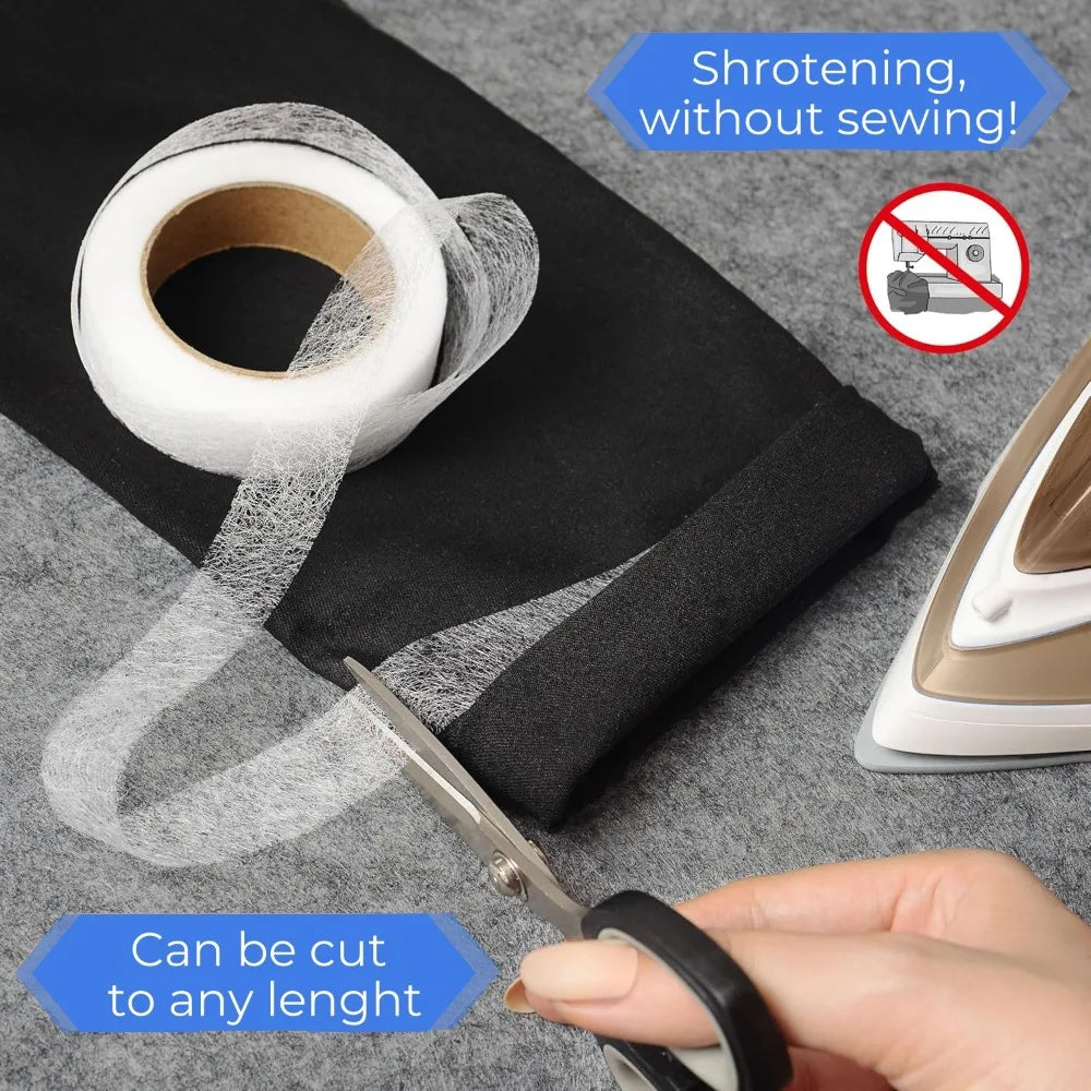 Roll of white ironing tape being cut with scissors on a black fabric surface