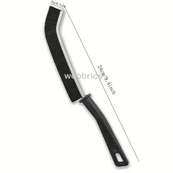 A black multifunctional hard bristle crevice cleaning brush with a long handle.