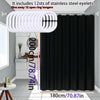 Pure black decorative shower curtain hanging on a rod with stainless steel eyelets.
