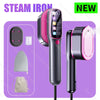 A black handheld garment steamer iron with a pink handle and various attachments shown on a purple background.