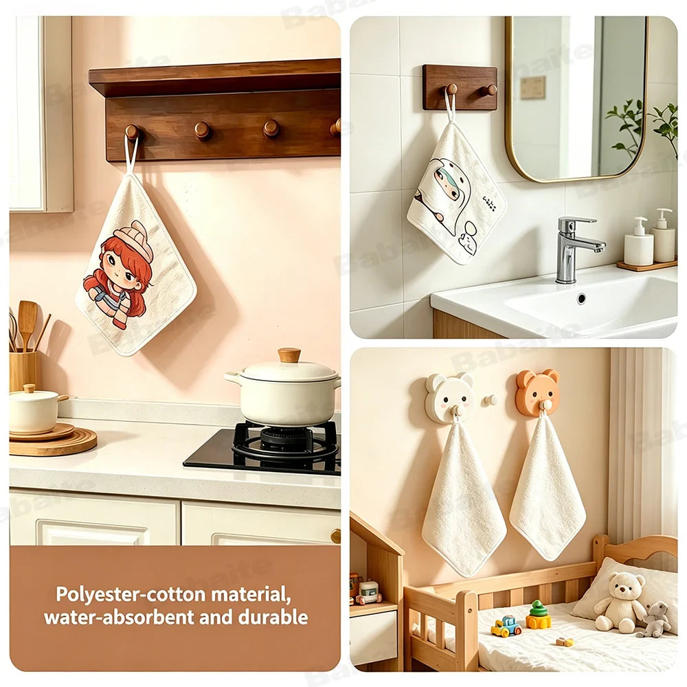 A white Totoro cartoon hanging hand wiping towel displayed on a bathroom wall.