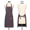 A dark purple all-purpose canvas apron displayed on a mannequin.