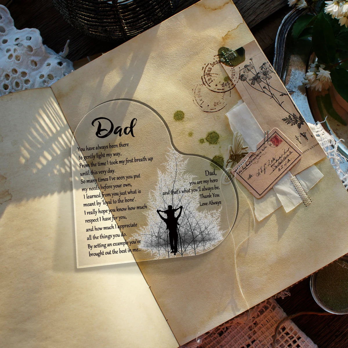 A handmade parchment keepsake plaque with handwritten text and a silhouette of a man on a light background.