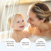 A mother gently looks at her baby in a bathtub filled with water, demonstrating the soft and safe features of the shower curt