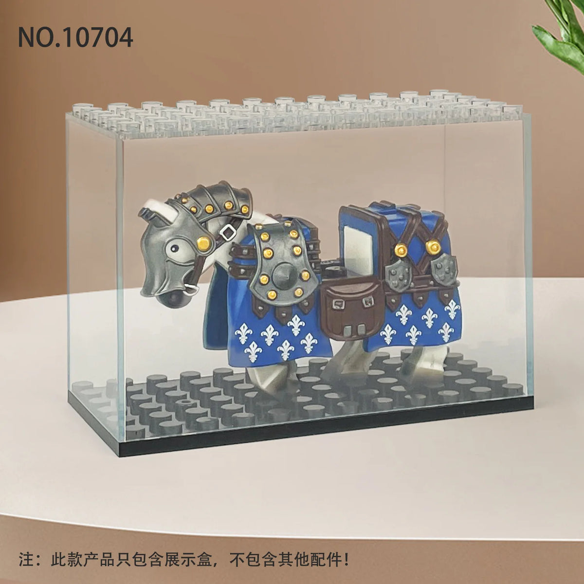 A clear display case featuring several collectible figures, including a horse and rider, set on a black base.