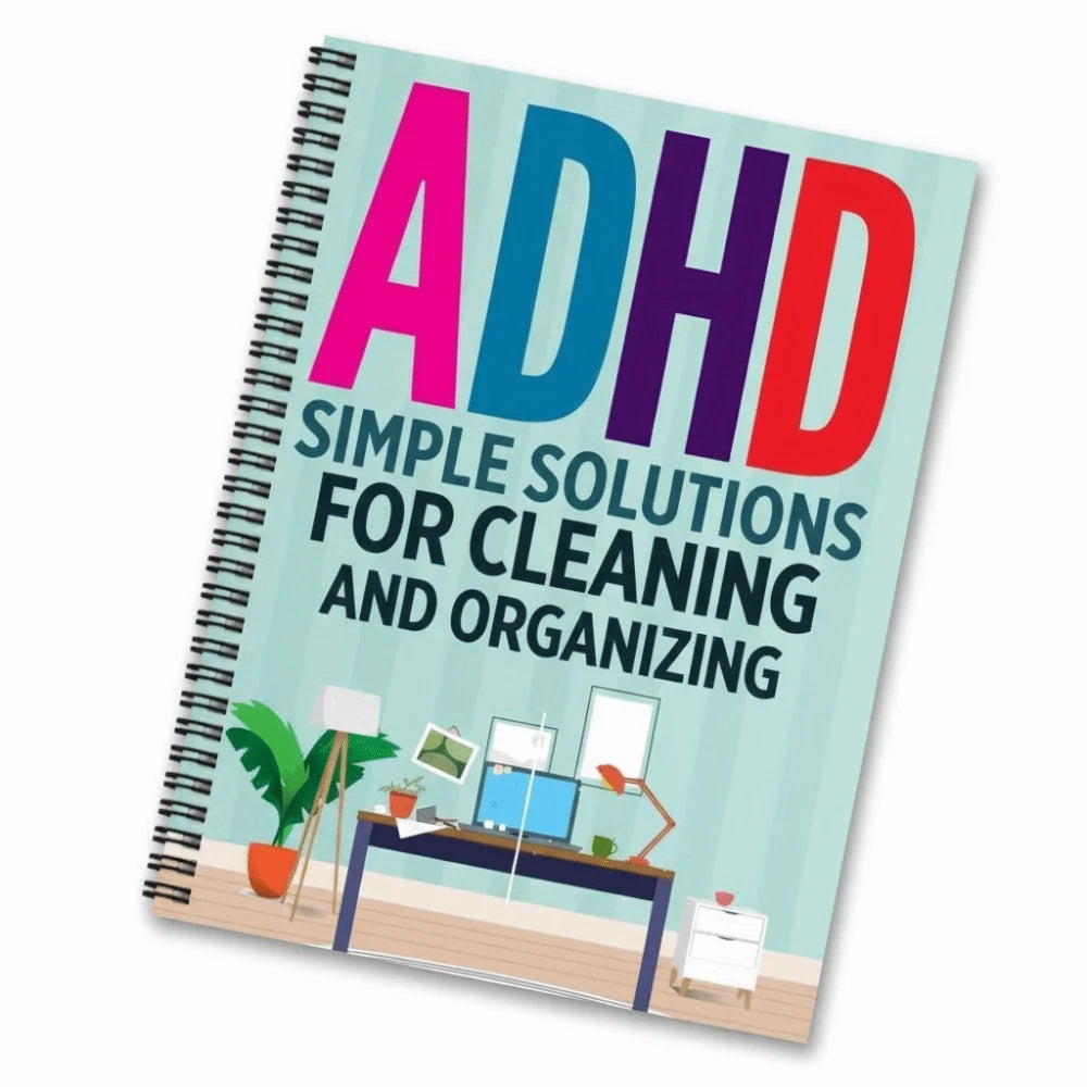 A spiral notebook titled ADHD Simple Solutions for Cleaning and Organizing with colorful text
