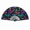 A black hand fan decorated with colorful holographic gradient butterfly patterns.