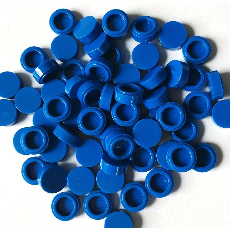 A pile of round blue building blocks used for DIY projects.