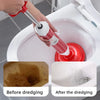 A hand is using a red heavy-duty toilet plunger to dredge and clean the inside of a white toilet bowl.