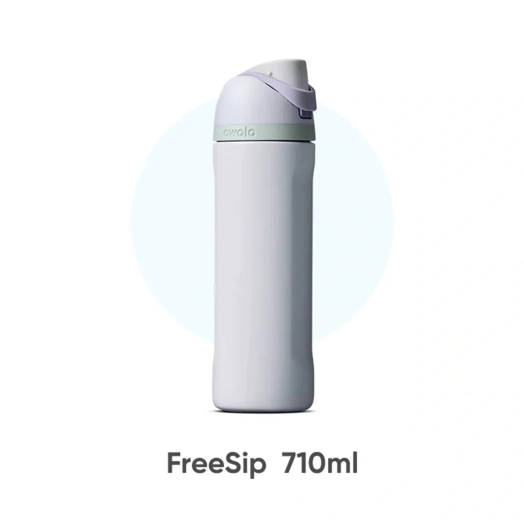 A white insulated water bottle with a light green cap and straw, labeled FreeSip 710ml.