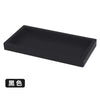 A rectangular black silicone tray organizer for kitchen or bathroom use.