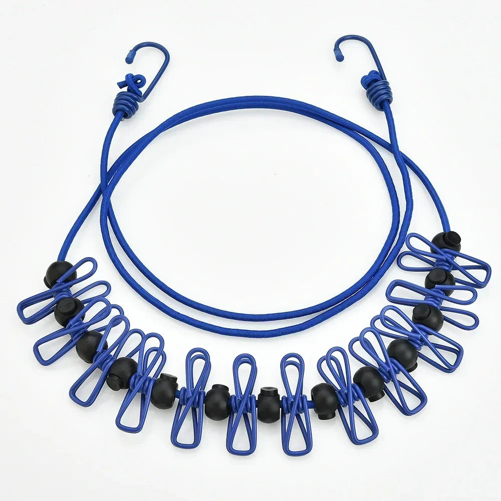 Blue adjustable elastic clothesline with black clips and loops for outdoor drying