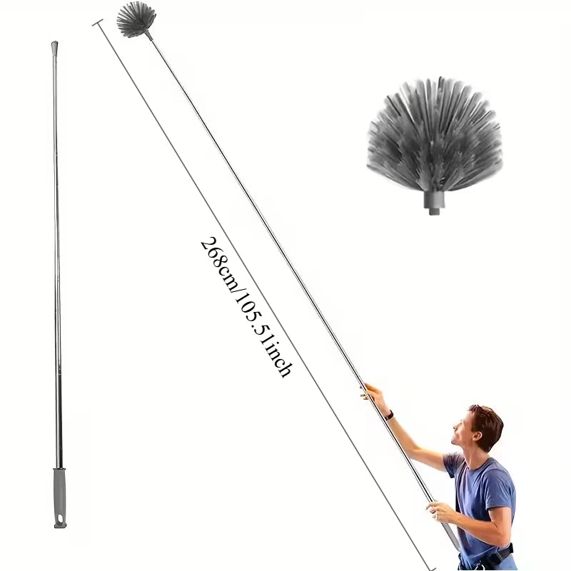 A long, adjustable metal cleaning broom with a bristled head is shown against a white background.