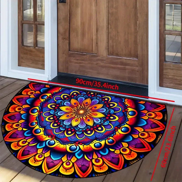 A colorful half circle floral entryway floor mat with intricate patterns placed on a wooden deck.