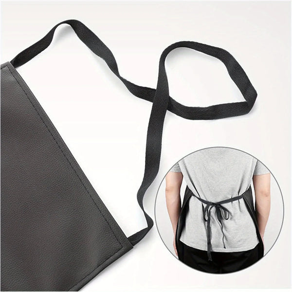 A black heavy-duty waterproof PU leather apron with adjustable straps shown alongside a person wearing it.