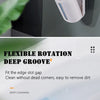 A white wall-mounted toilet brush cleaning kit is shown being used to clean the inside of a toilet bowl.