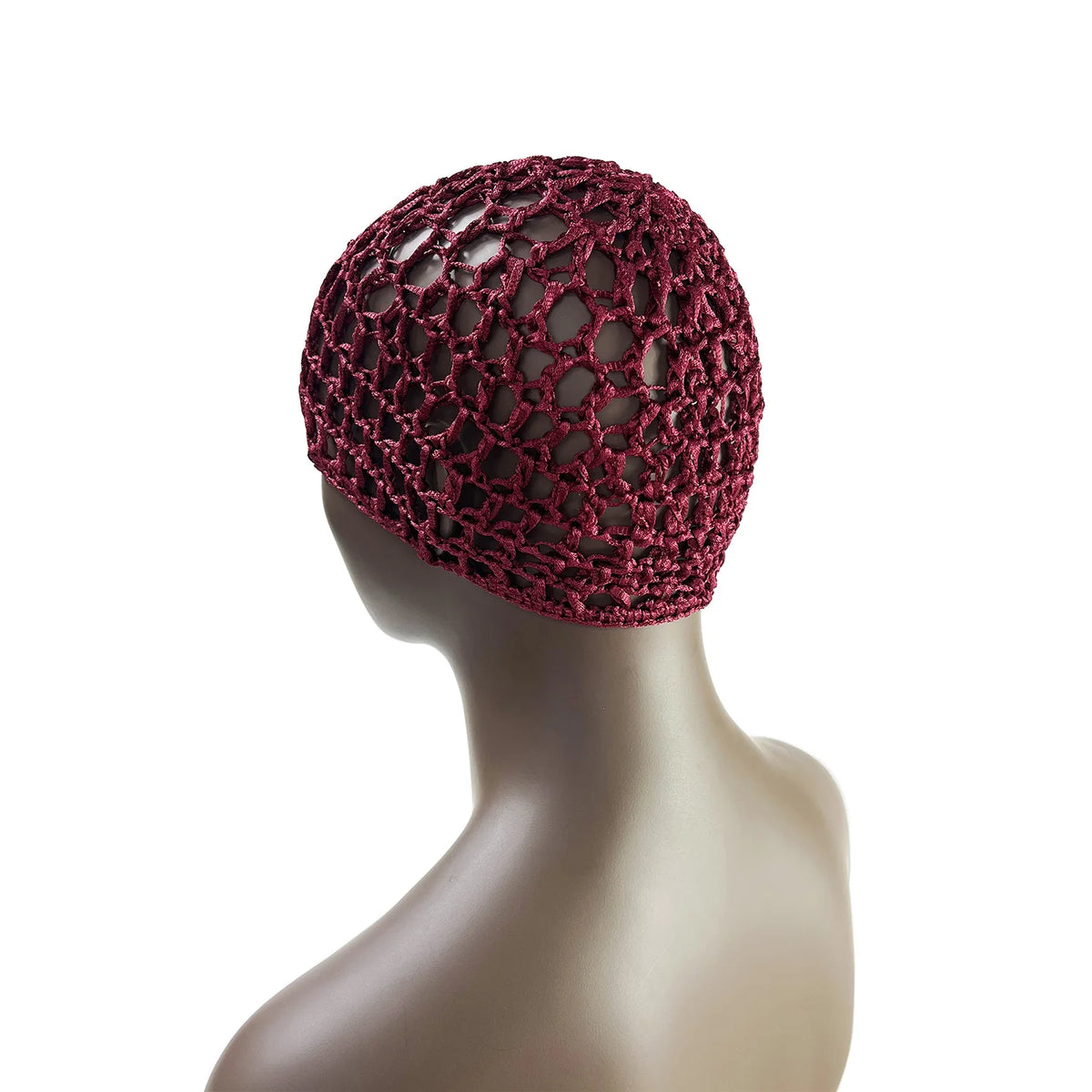 A close-up of a hand-crocheted mesh hair net cap in deep burgundy color displayed on a mannequin head.