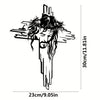Black metal cross wall art featuring a face with long hair and beard