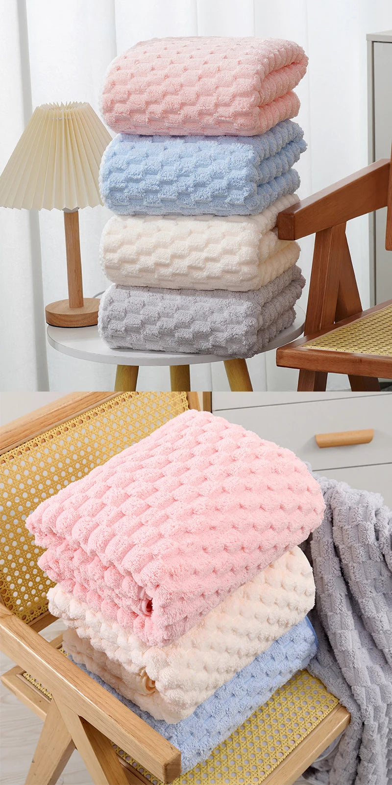 Stack of pink, blue, and gray thickened microfiber bath towels on a wooden surface.
