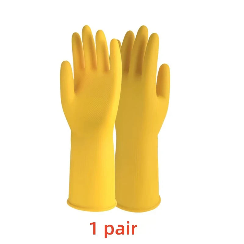 A pair of yellow silicone dishwashing gloves with forks.