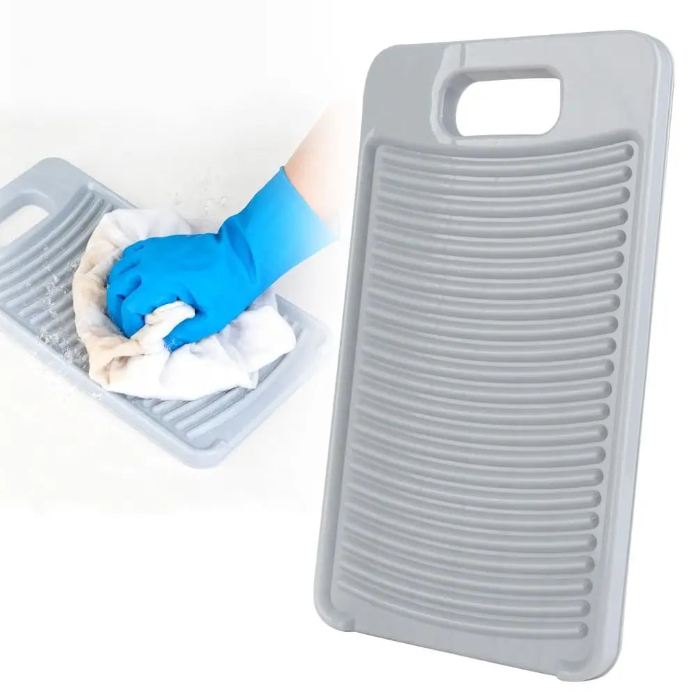 A gray fabric washing board with a handle is shown next to a hand wearing a blue glove and a white cloth.