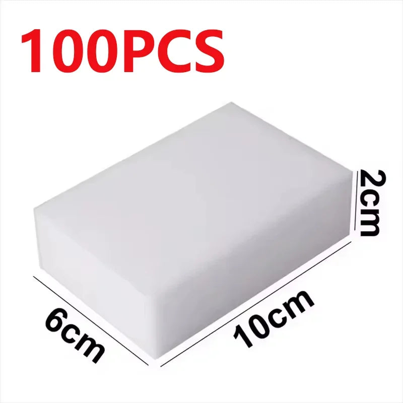 A rectangular white cleaning sponge product with dimensions 6cm by 10cm and a thickness of 2cm, shown from above.