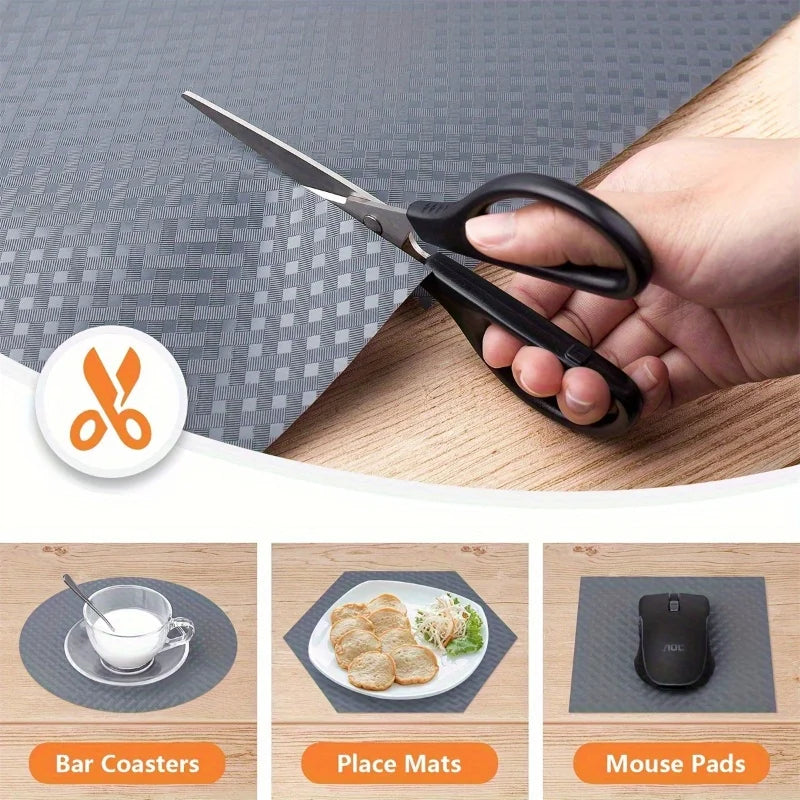 A hand is using a pair of scissors to cut a reusable shelf liner, demonstrating its use for kitchen and drawer protection.