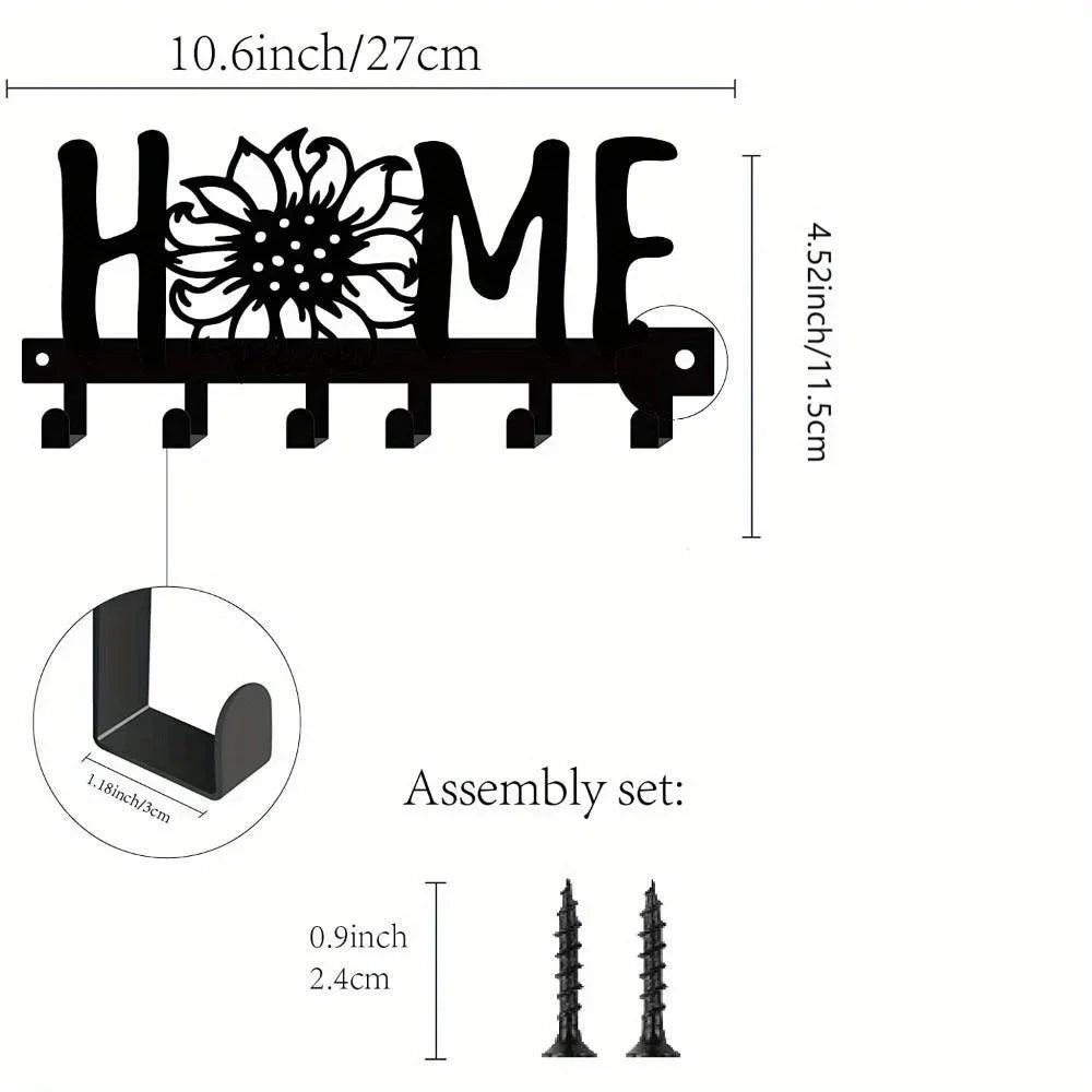 Black rustic metal wall hook key holder with a decorative flower design and assembly set.