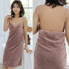 A woman models a mauve bath wrap towel draped over her body, shown from the front and back.