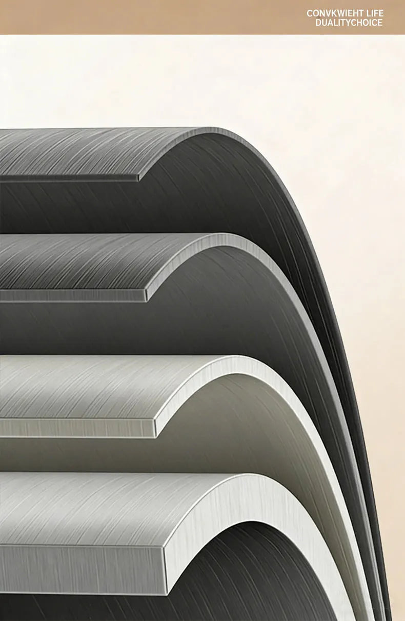 Close-up of a stainless steel spring tension shower curtain rod with curved, ribbed design.