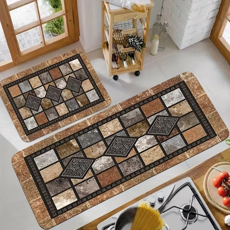 Reihenteppich aus geometrischen Steinquadraten in erdigen Brauntönen, Grau und Beige.