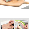 A stack of five eco-friendly double-sided cleaning sponges showing various colors and textures used for dish, sink, and stove