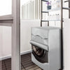 A silver Oxford washing machine cover with a roll edge is displayed inside a modern kitchen cabinet.