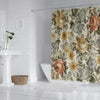 A vintage floral print shower curtain featuring roses and yellow flowers hanging in a bathroom.