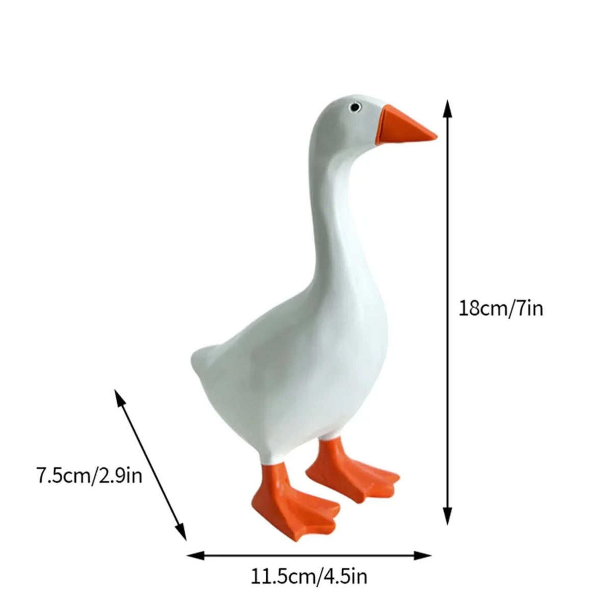 White goose key chain sculpture with orange beak and feet, shown in profile.