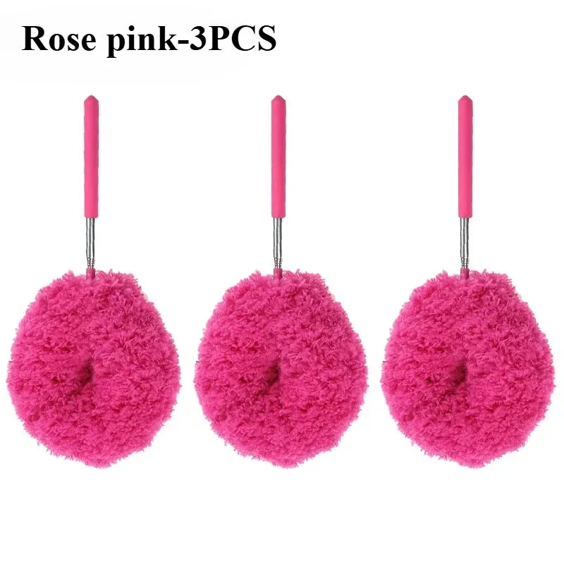 Three rose pink extendable microfiber dusters with pink handles