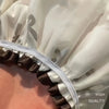 Close-up of white and brown reusable double layer shower caps for hair