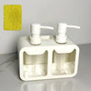 A white 3-in-1 kitchen soap dispenser set with three pump bottles and a yellow sponge visible on a light surface.