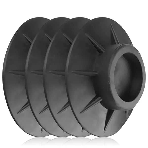 A set of black anti-vibration rubber pads for washing machines and dryers.