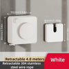 White retractable clothesline with a round pull handle mounted on a wall.