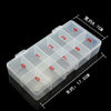 A transparent plastic organizer box with numbered compartments for nail art storage.