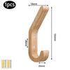 A natural oak wood wall hook shaped like a curved letter, with mounting screws shown below.