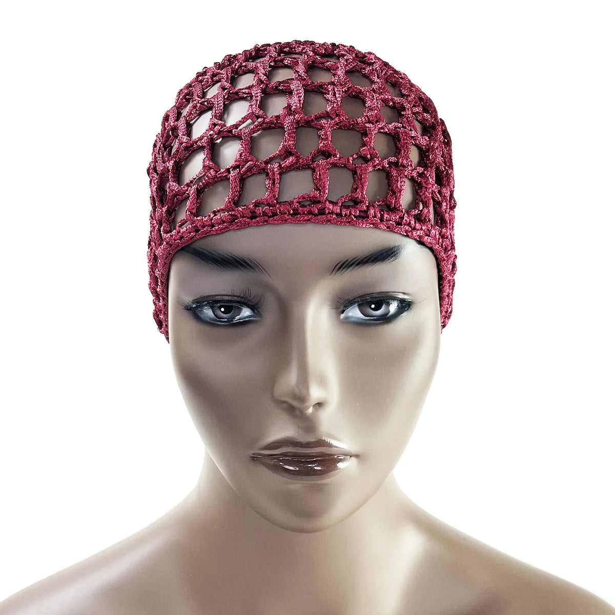 A model wears a deep magenta hand-crocheted mesh hair net cap on her head.