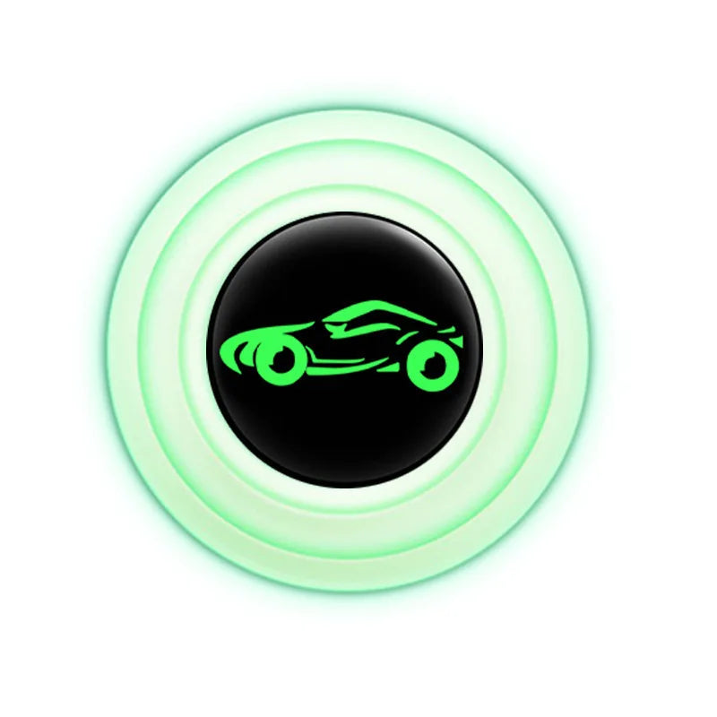A round, glowing light fixture with a black center featuring a green car silhouette.