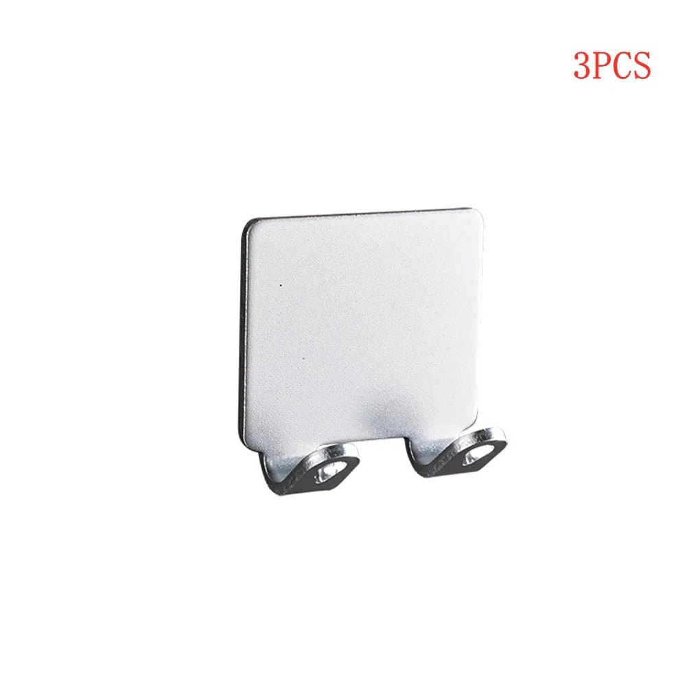 Three aluminum shaving razor storage racks shown against a white background.