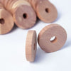 A close-up view of several natural cedar wood blocks used for pest deterrents.