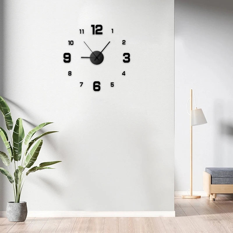 A black analog wall clock with Roman numerals is mounted on a white wall above a wooden floor.