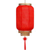 A durable antiqued red Chinese lantern with gold accents, hanging from a cord.