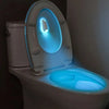 A white toilet with a built-in light fixture glowing blue inside the seat.
